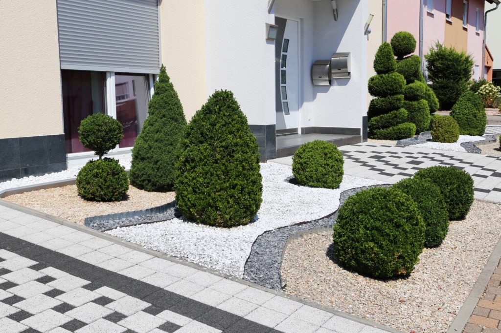 A gravel path leading to a home