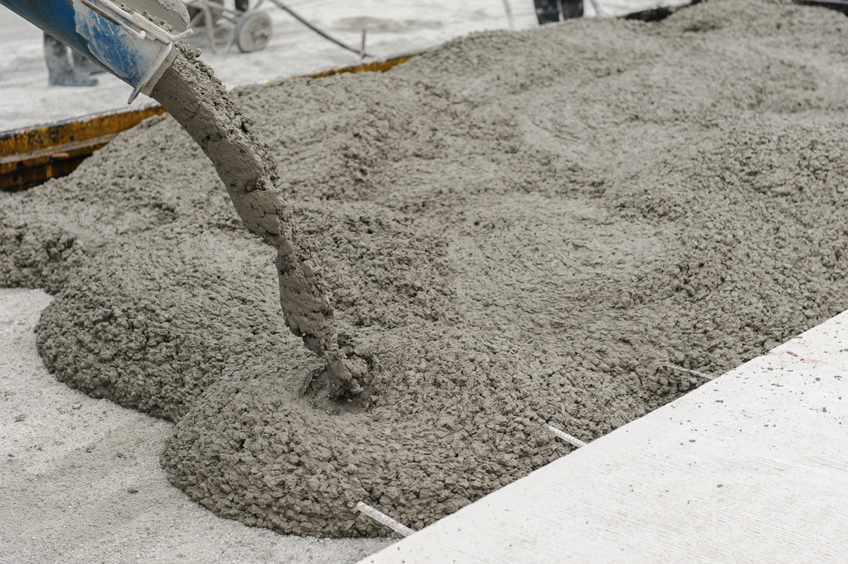 Industrial concrete being poured at a Hobbs construction site.